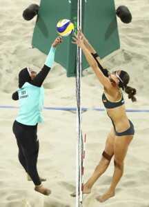 2016 Rio Olympics - Beach Volleyball - Women's Preliminary - Beach Volleyball Arena - Rio de Janeiro, Brazil - 07/08/2016. Doaa Elghobashy (EGY) of Egypt and Kira Walkenhorst (GER) of Germany compete. REUTERS/Lucy Nicholson FOR EDITORIAL USE ONLY. NOT FOR SALE FOR MARKETING OR ADVERTISING CAMPAIGNS.